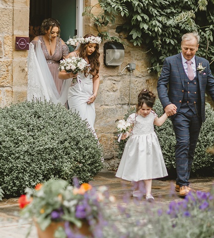 wedding party heading to the ceremony