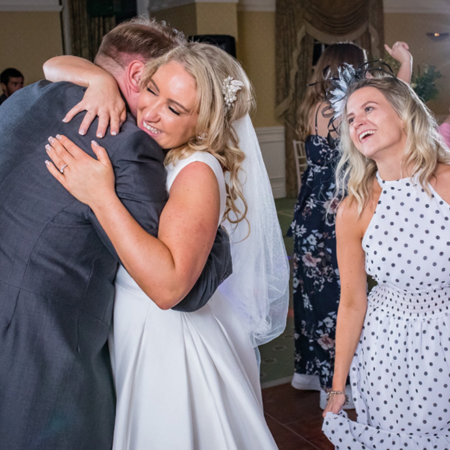 bride and groom embracing