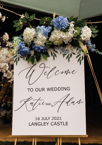 welcome sign with flowers