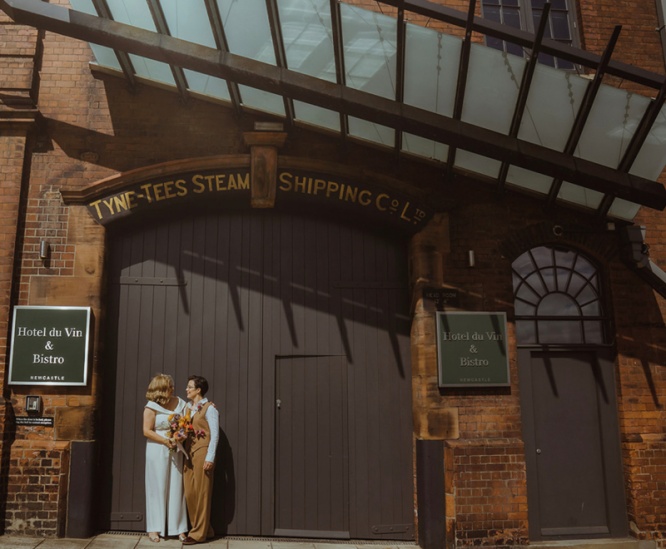 Emma and Ruth in front of Hotel Du Vin on their wedding Day