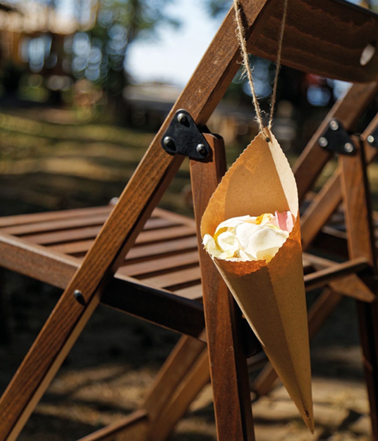 confetti cone hanging on a wooden chair