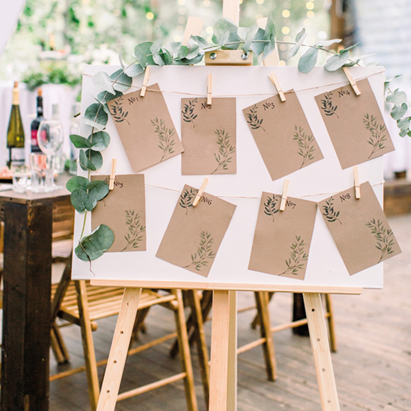 Easel with table plan and flowers