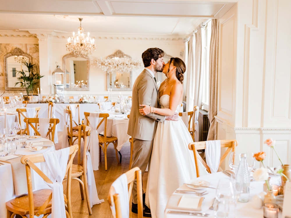 Bride and Groom kissing at Eaves Hall