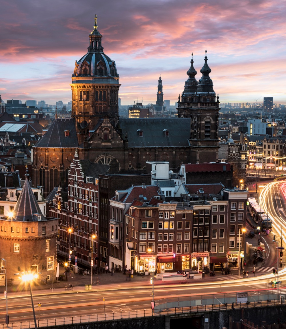 Amsterdam skyline at night - Dreamstime.com