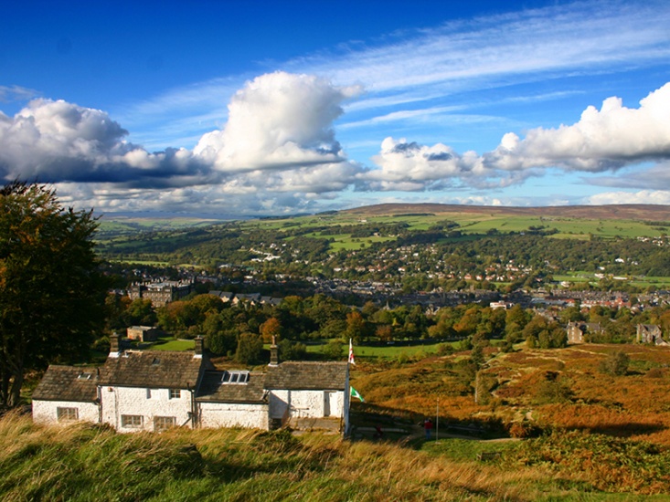 White Cottage surrounded by fields, overlooking Ilkley