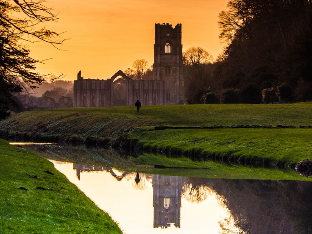 Fountains Abbey with orange skies