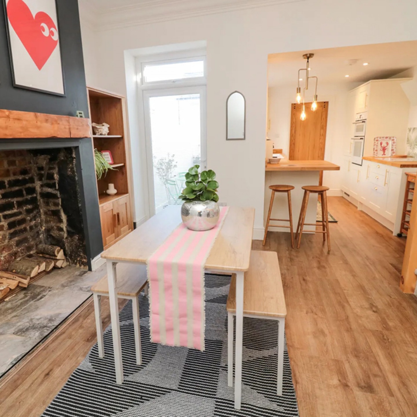 Dining room and kitchen at Cowrie Cottage