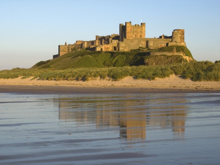 Castle on the Hill with a beach in front