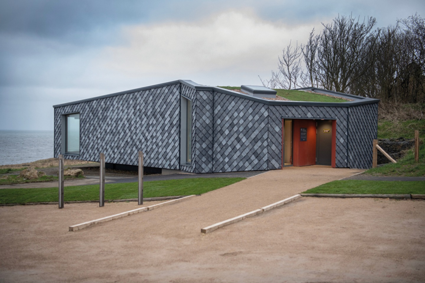 Whitburn Coastal Conservation Centre a grey building with large windows