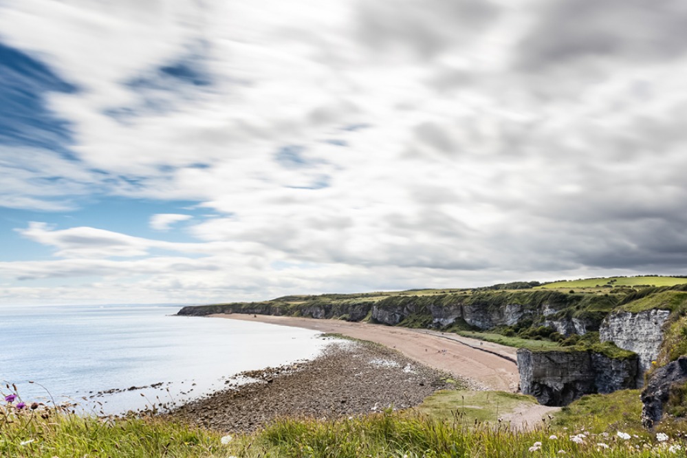 Durham Heritage Coast and view of Blast Beach on a sunny summer day