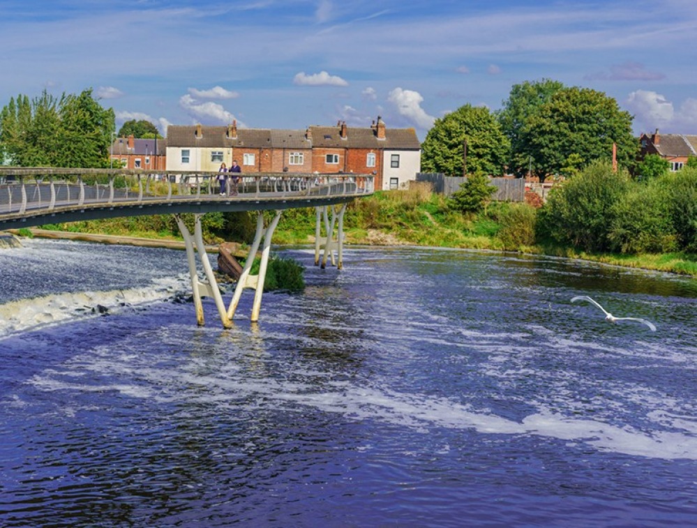 Castleford S-shaped Footbridge Over the Fast Flowing River Aire and Weir