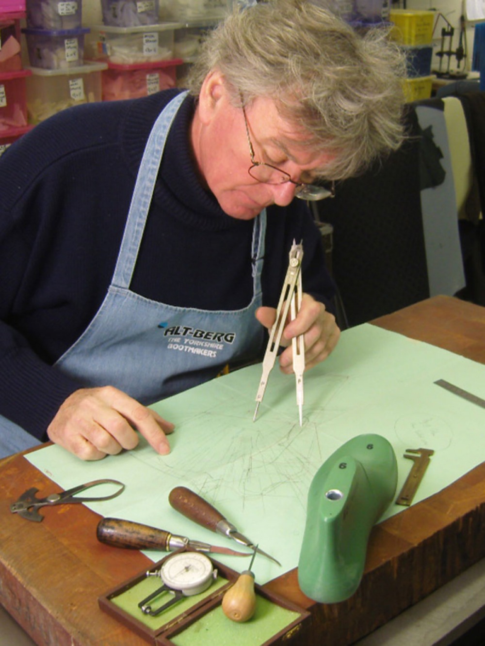 Man designing shoes