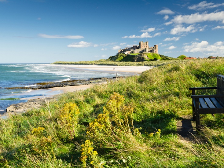 castle on a hill infront of the beach