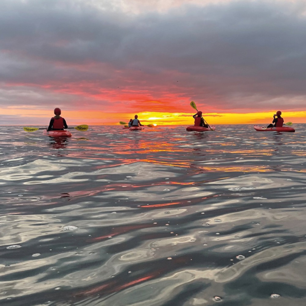 kayaking in the sunset
