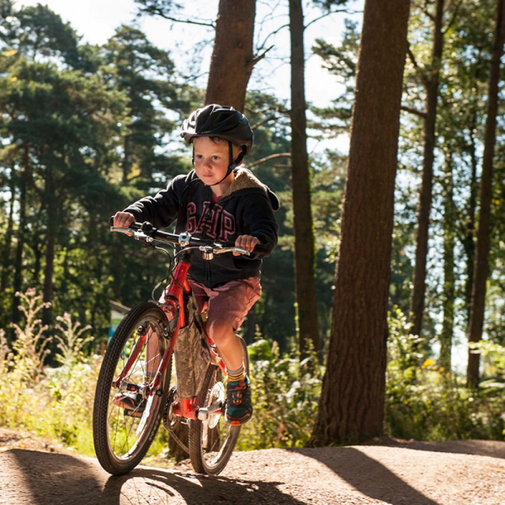 boy riding his bike