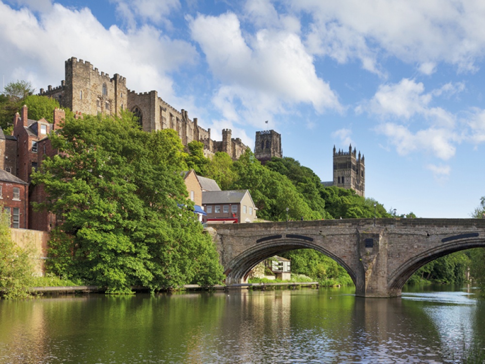 river with bridge and cathedral