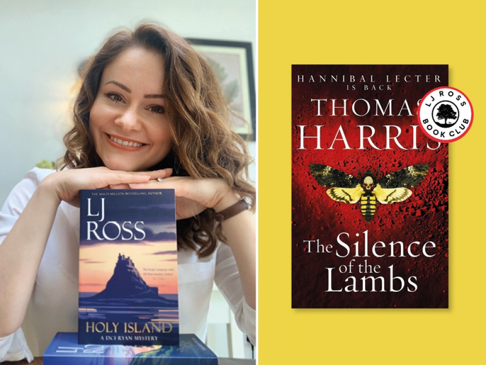Author LJ Ross with the cover of The Silence of the Lambs