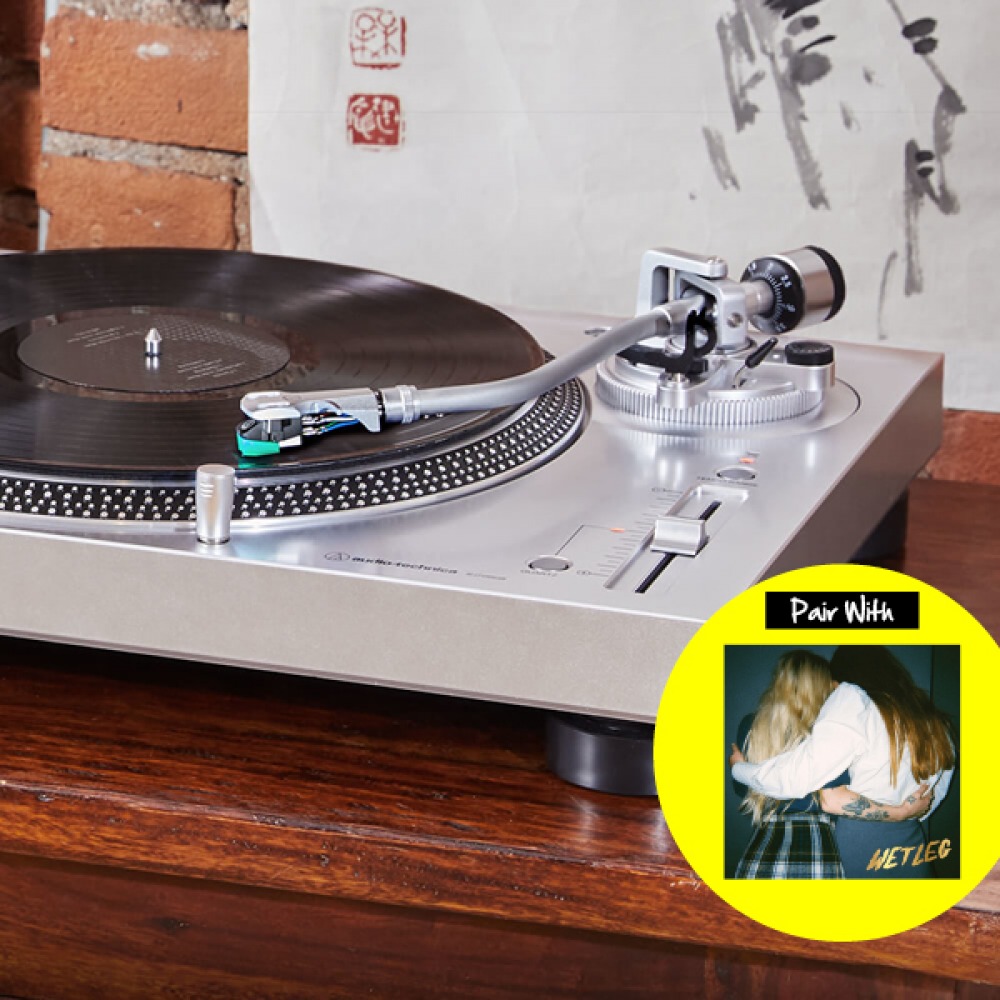 record player with image of vinyl cover overlaid