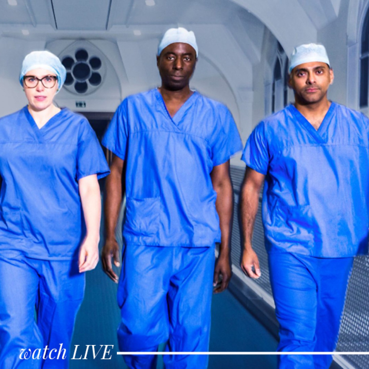 3 doctors walking along a hospital corridor