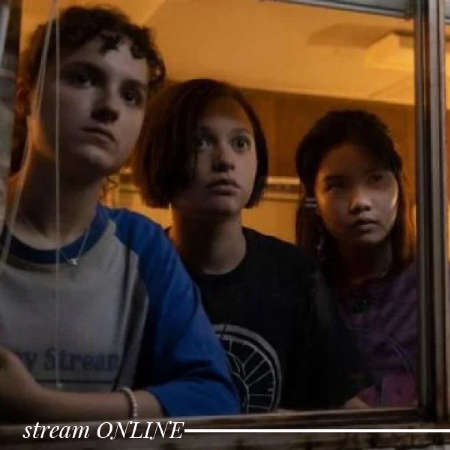 girls looking out caravan window