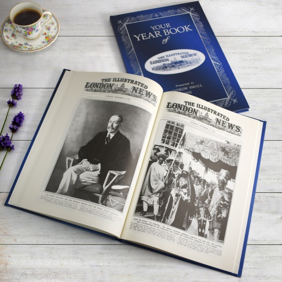 The Illustrated London News Archive Book on table with cup of tea