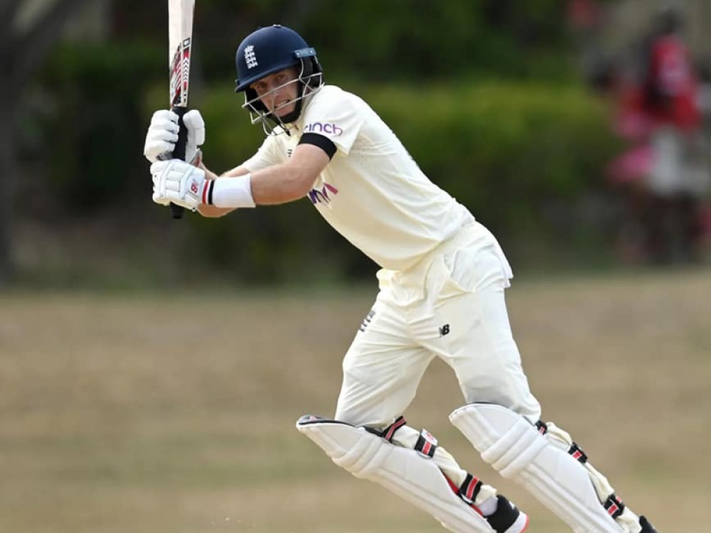 cricket player swinging the bat