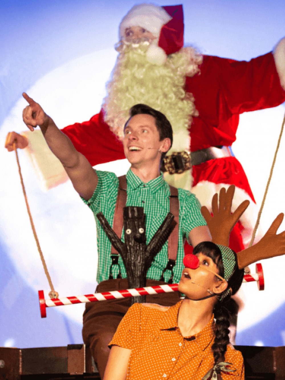 Actors dressed as Santa, Stick Man and Rudolph