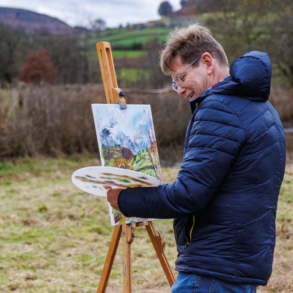 Garth Bayley Painting a landscape