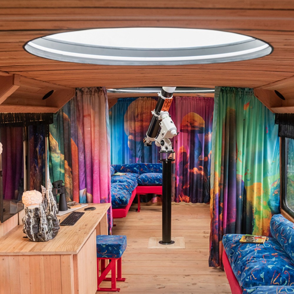 Moon Palace wooden interiors from Studio Morison's forest and upcycled bus seats (c) Charles Emerson