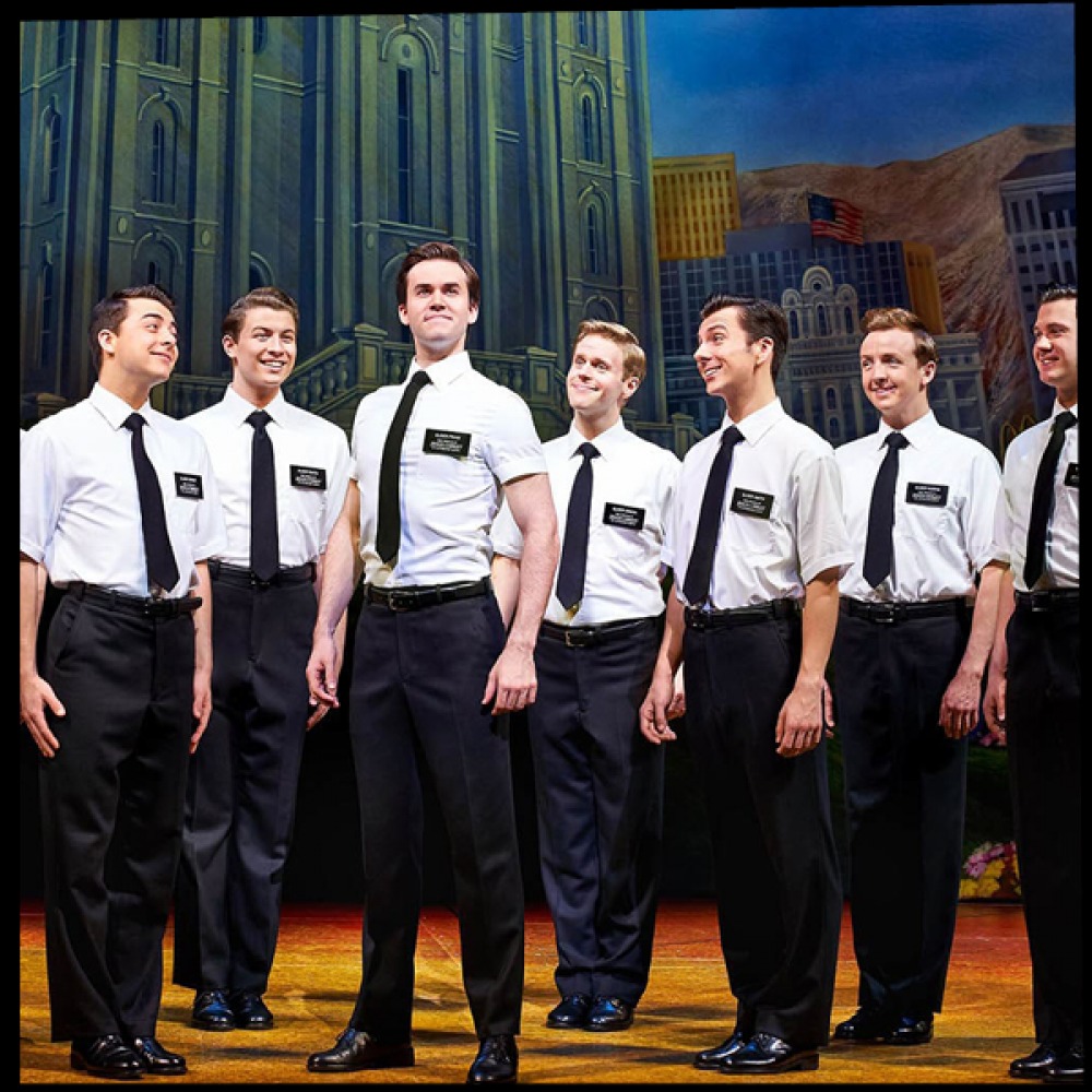 men on a stage performing
