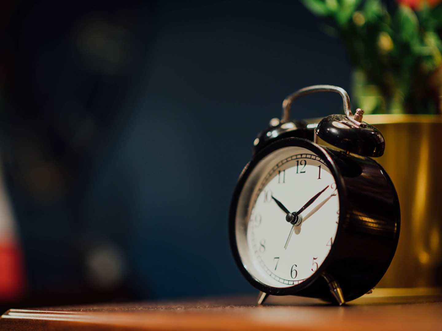 Alarm clock on side table