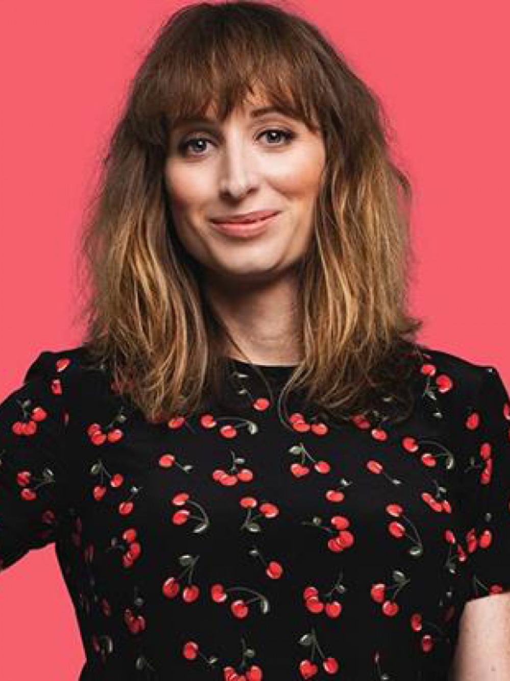 Isy Suttie with pick background