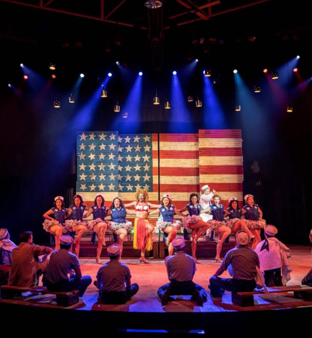 South Pacific cast on stage