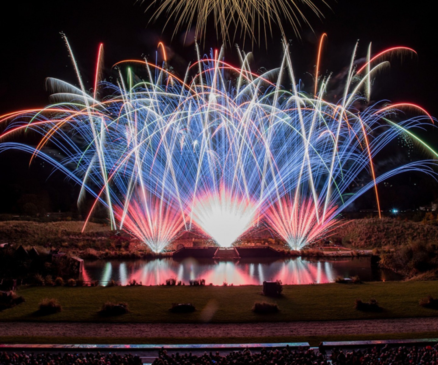 Firework display over a lake