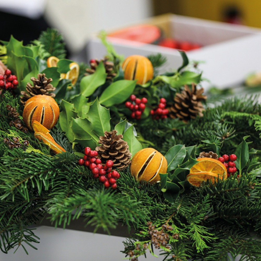 Christmas wreath being made