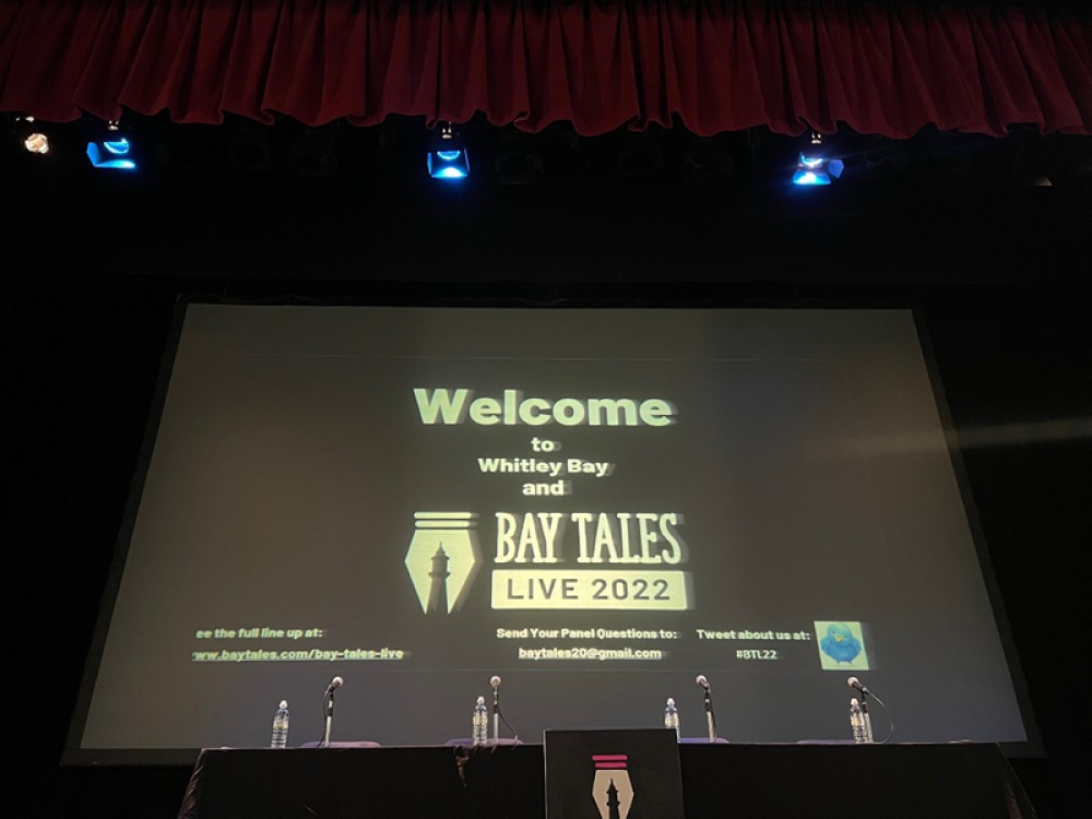 large projector screen on stage