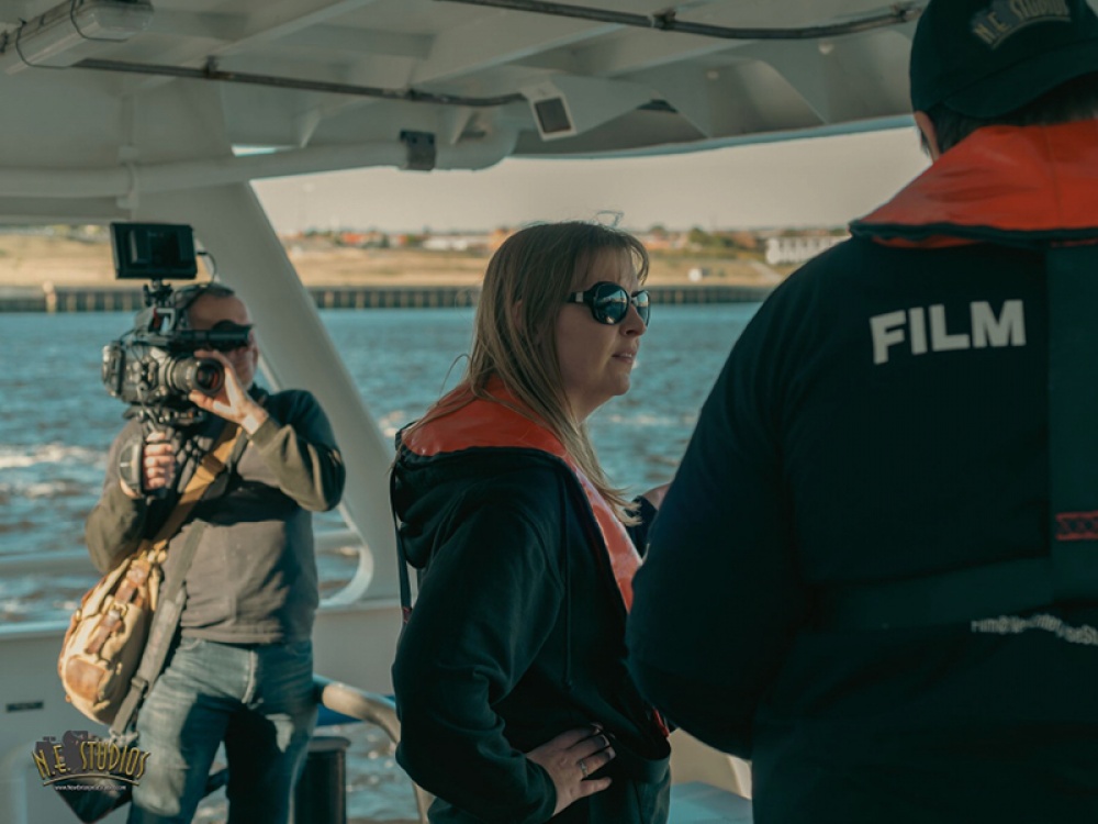 film crewing filming two people