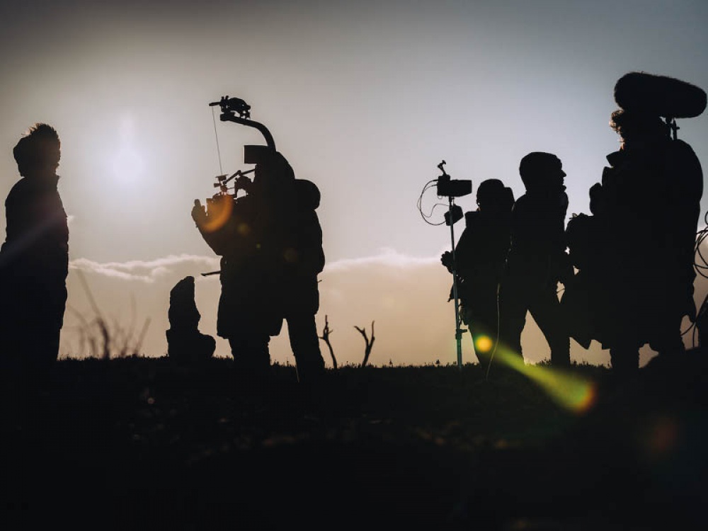 silhouettes of a film crew