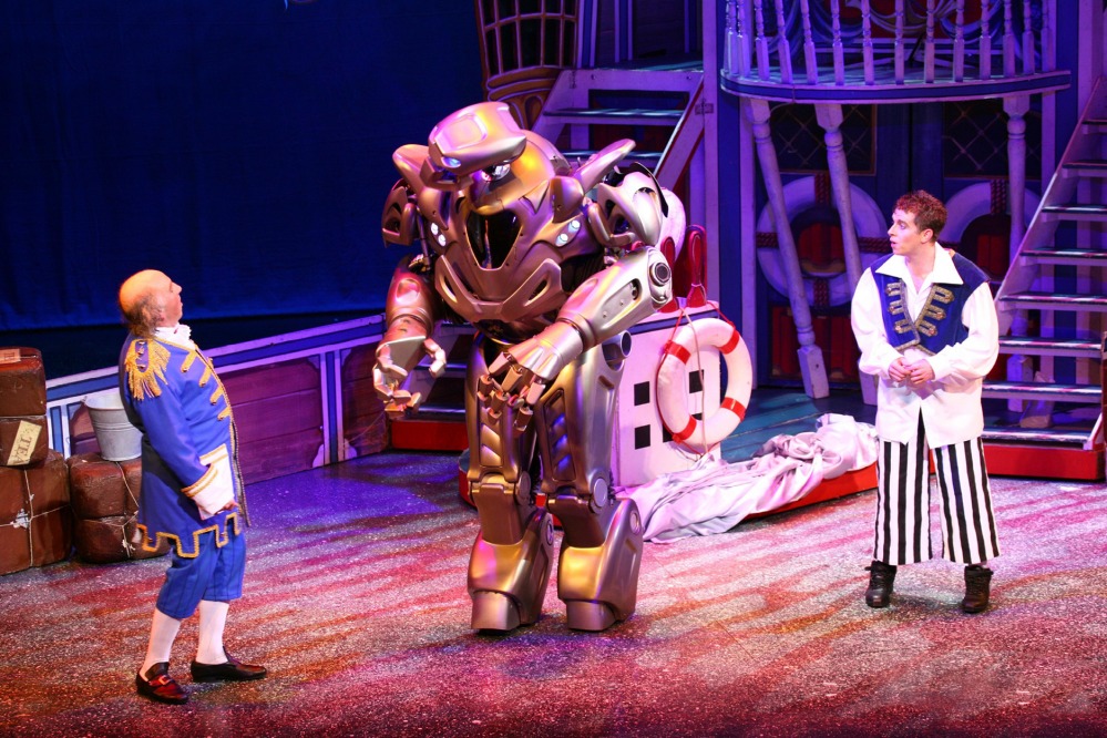 Danny and Clive on stage with a robot in Robinson Crusoe, 2008