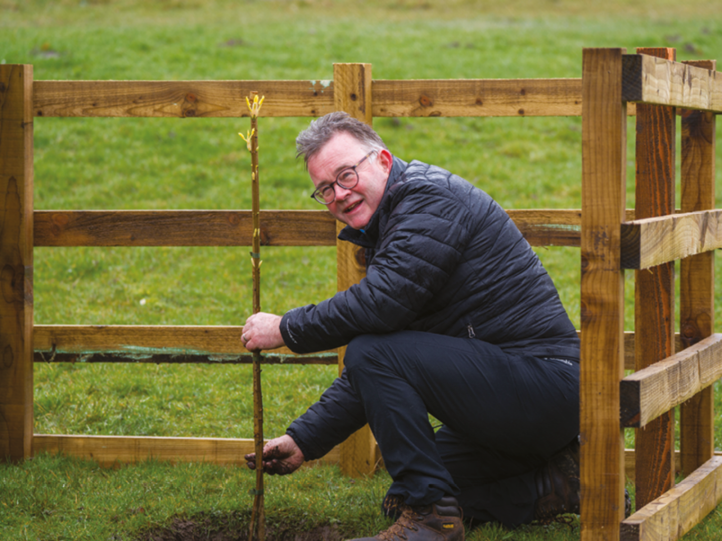 Tony Gates planting Sycamore Gap sapling at Walltown Country Park  © Alasdair Mackenzie