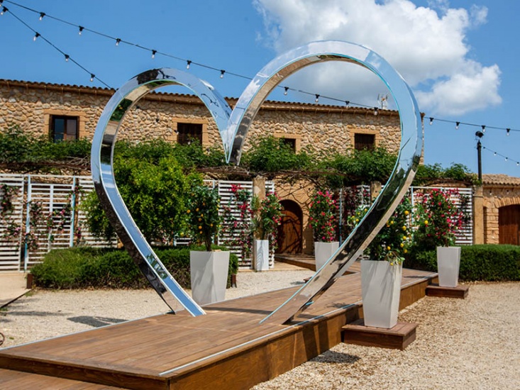 Love Island heart on built up area in garden