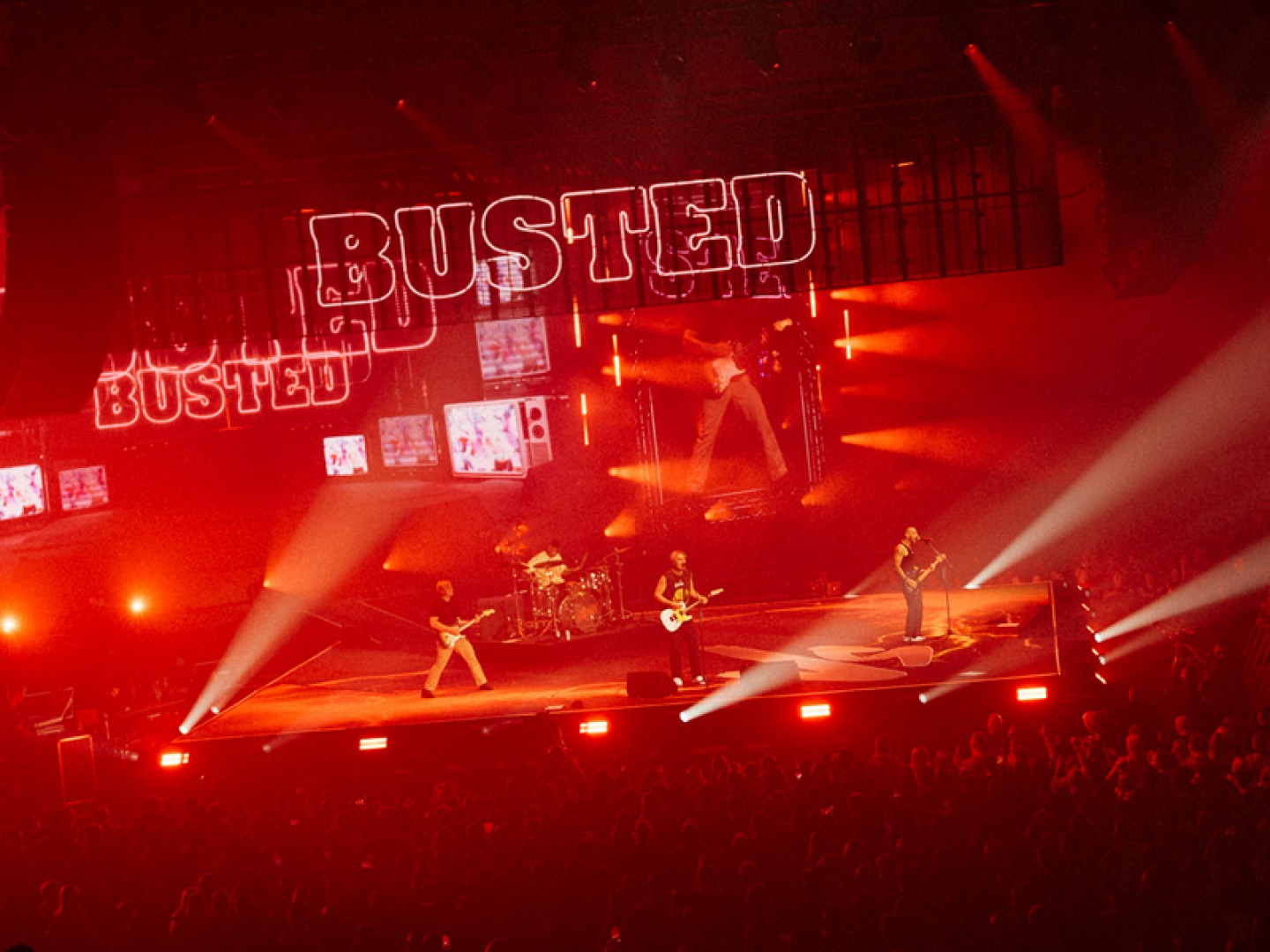 Busted on stage playing to a stadium crowd