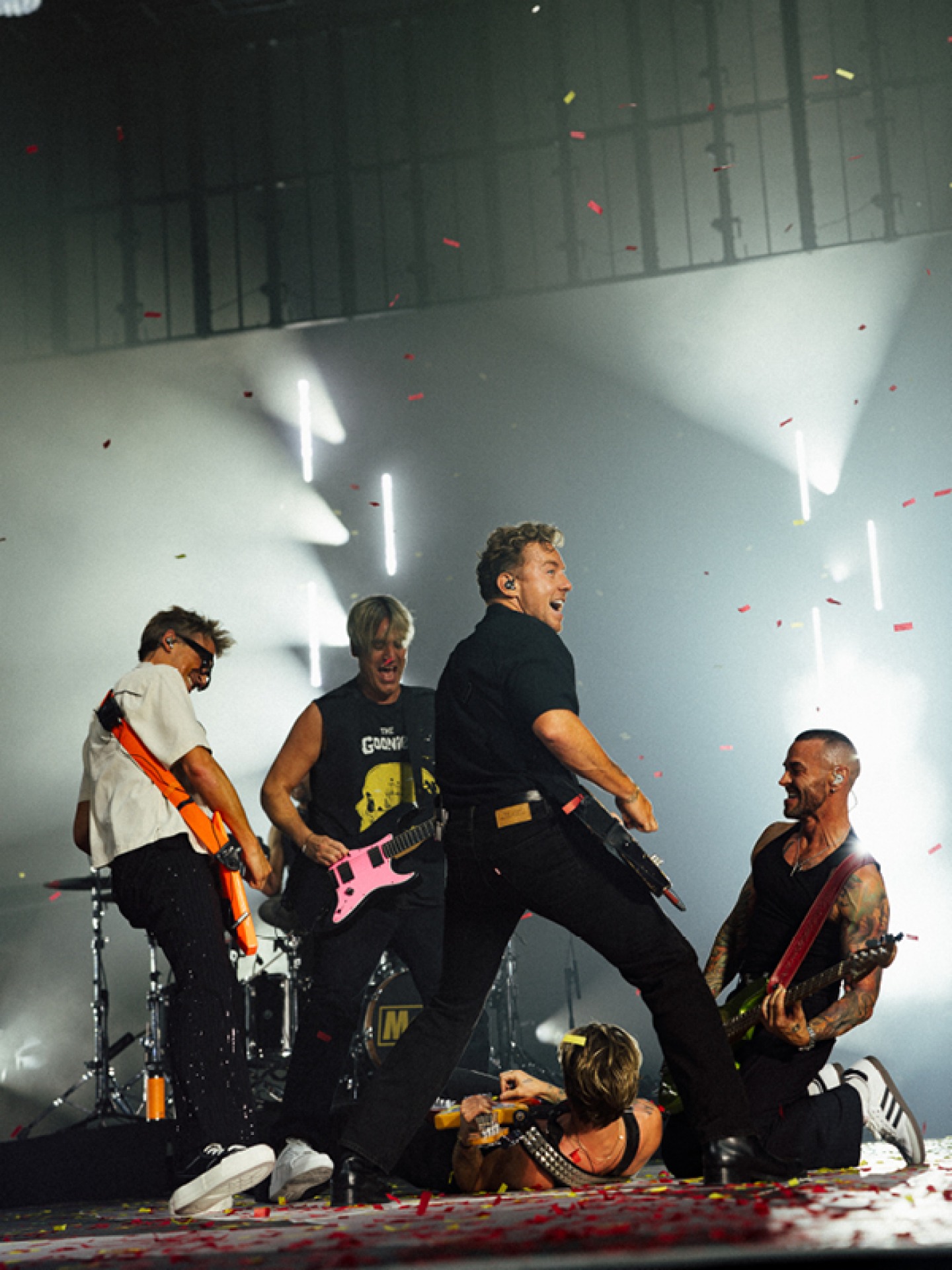 Mcfly and Busted playing together on stage