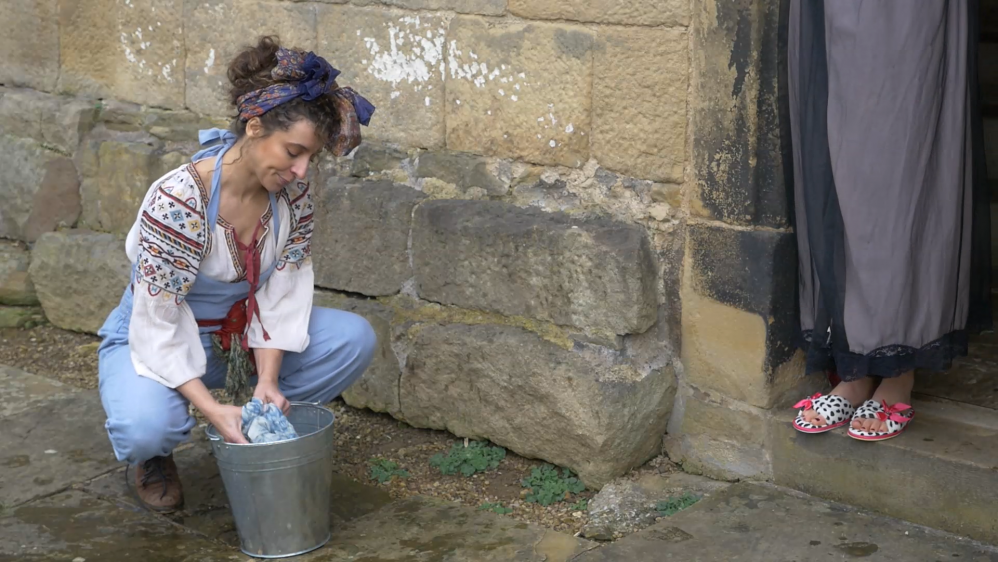 Claire Wild playing Cinderella at home (at Calverley Old Hall), Northern Opera Group