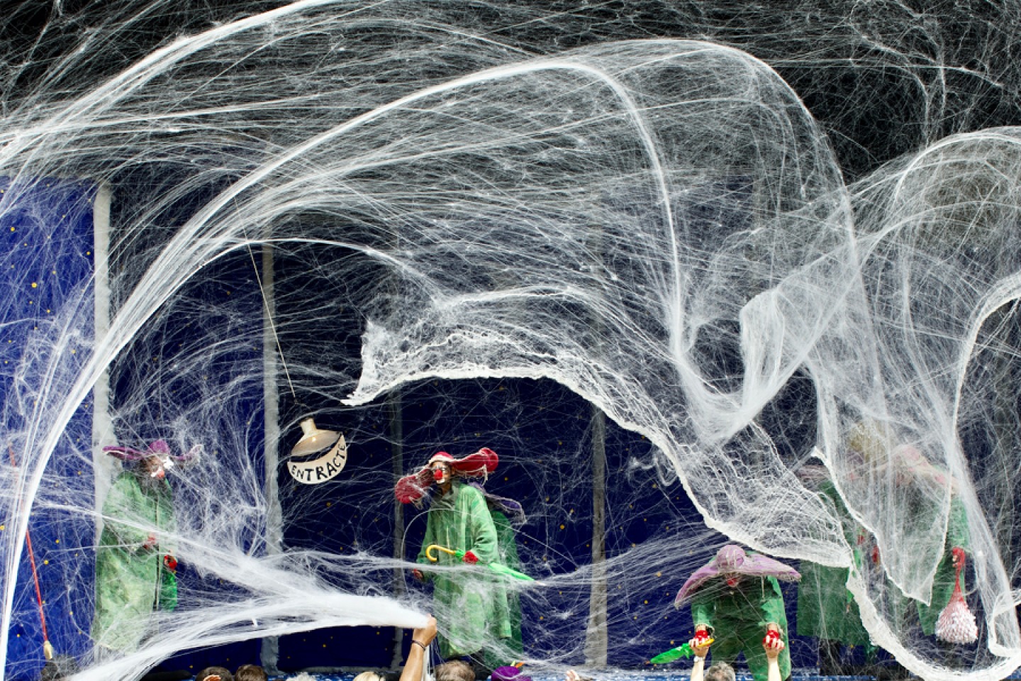 Slava Snowshow greenz in giant spider web by Aya Rufin