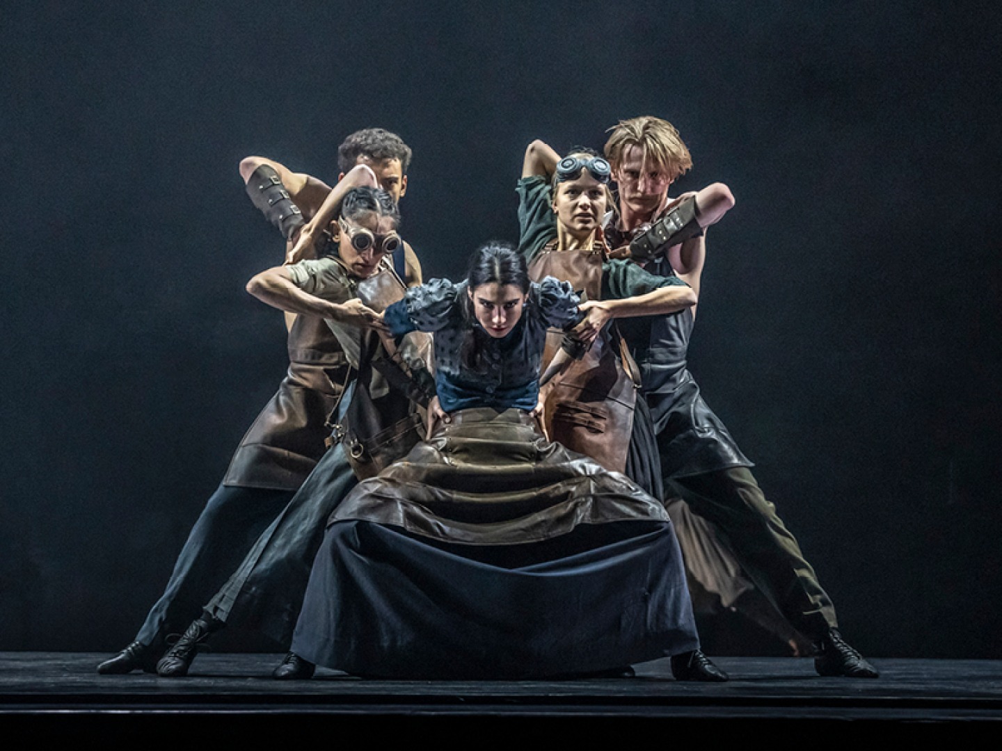 cast members of Rambert's Peaky Blinders The Redemption of Thomas Shelby dancing on stage