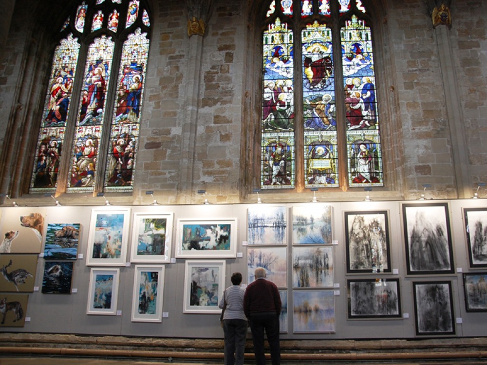 People looking at art at The Great North Art Show