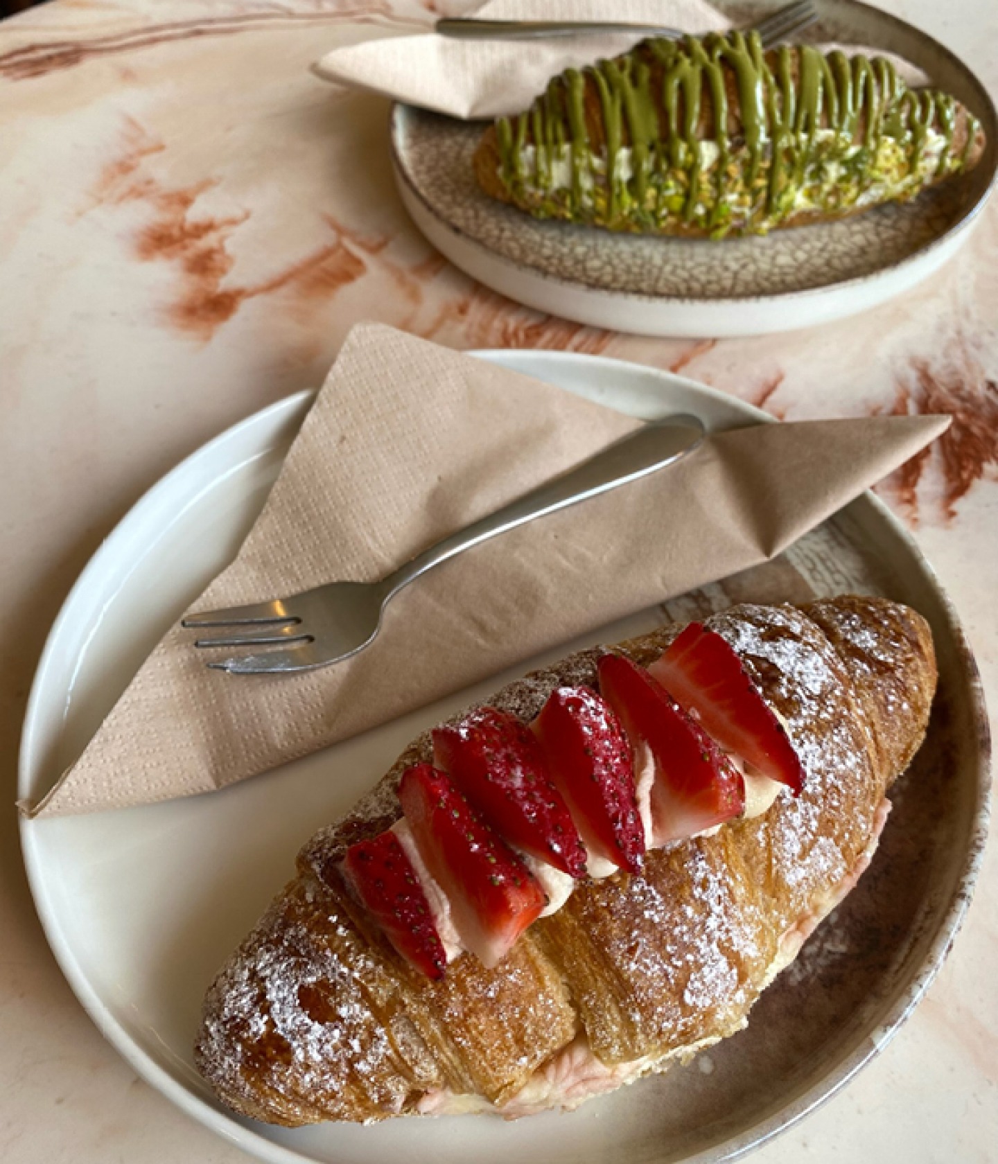 Strawberry cream Croissant and pistachio cream croissant