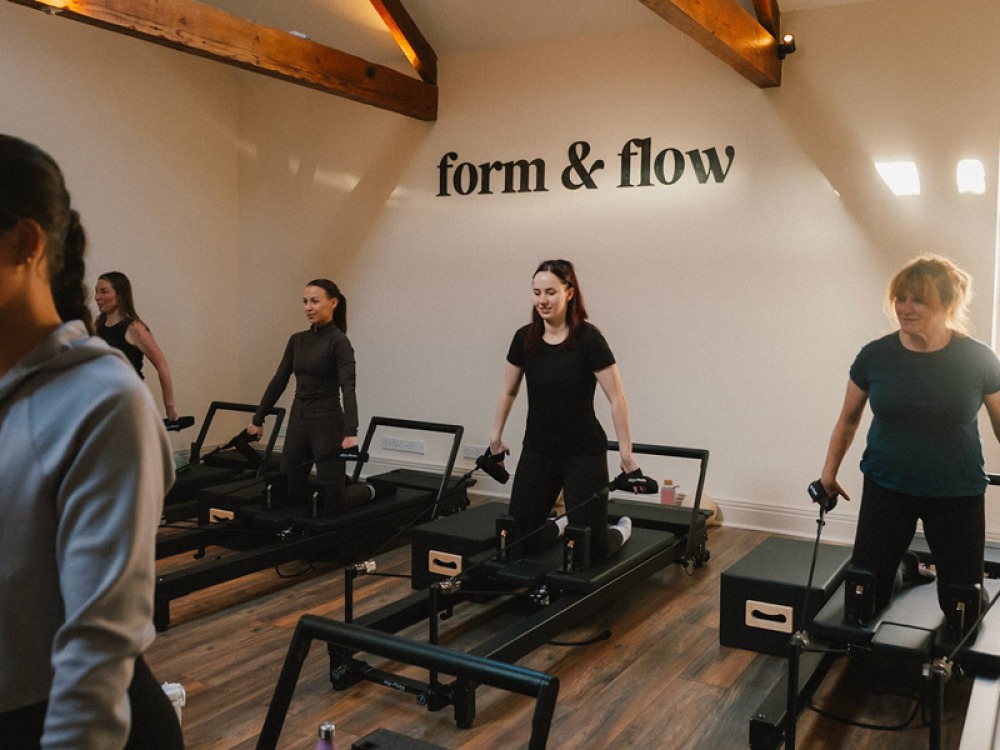 Form & Flow Studio Pilates class