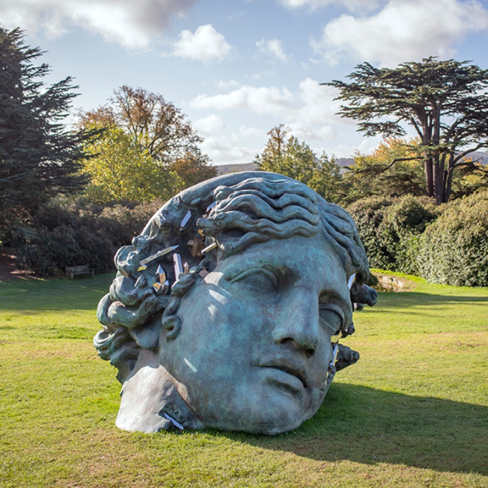 Daniel Arsham, Unearthed Bronze Eroded Melpomene, 2021. Installation view at Yorkshire Sculpture Park. Courtesy Perrotin Gallery and Arsham Studio. Photo by Anthony Devlin/Getty Images for Daniel Arsham